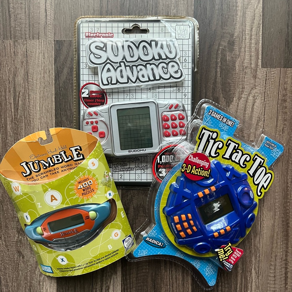 Vintage game lot tic tac toe - sudoku - jumble handheld new sealed radica mix
